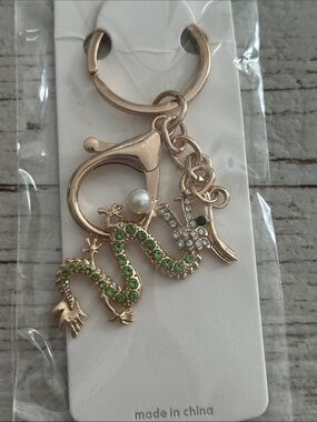5/$25 Gold Dragon & Crane Keychain with Green Rhinestones